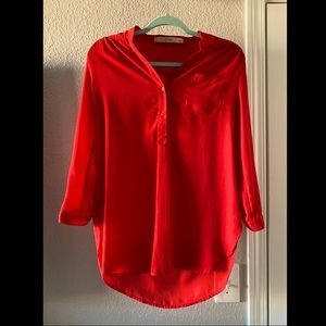 Red quarter button sheer long sleeve blouse